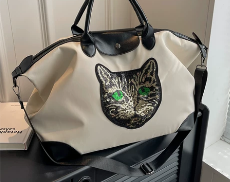 旅行包女大容量手提便携防水行李包短途出差旅...