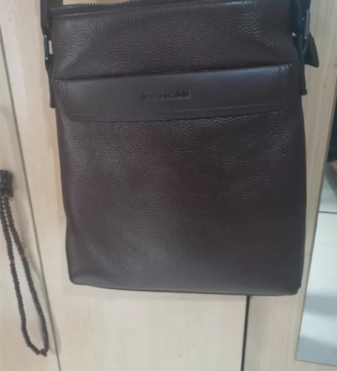 稻草人单肩斜挎包 感兴趣的话点“我想要”和...