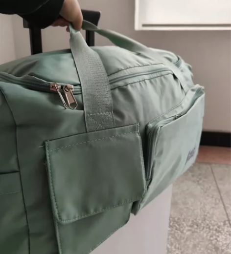 全新旅行包大容量女超大拉杆箱手提包便携出游...