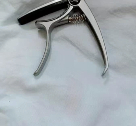 【处理】全新 吉他变调夹一夹俩用民谣吉他变...