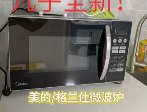 低价转让闲置二手微波炉家用小型微蒸烤一体平...