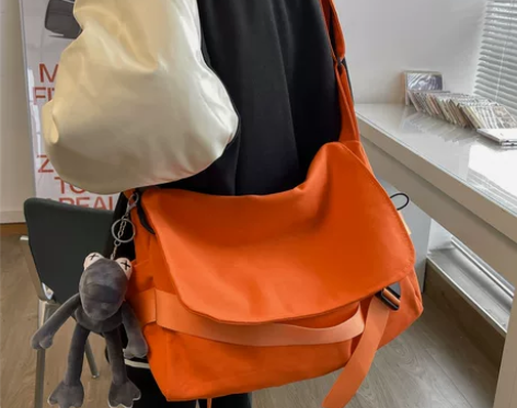 帆布包女斜挎包女百搭ins大容量学生上课包...