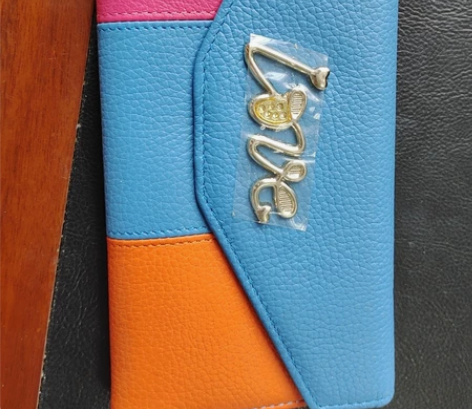 纯羊皮女士长款钱包，卡位够多，很软，颜色靓...