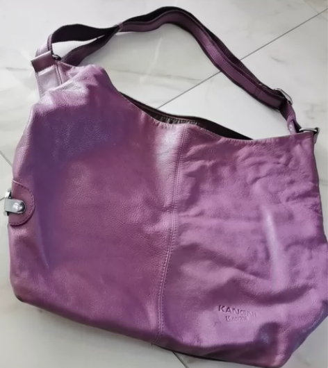 纯牛皮品牌背包商场买的原价一千多的，25包...