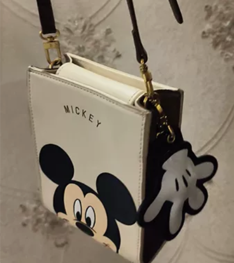 不莱玫斜挎小方包，有短链，可手提。包包比较...