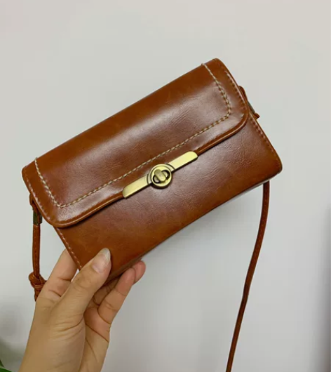 超级轻巧的斜挎包，各层多，肩带可调节，长2...