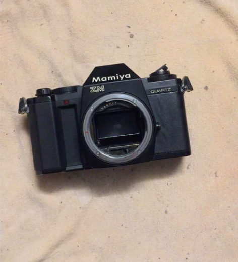 玛米亚zm胶片单反相机 外观如图 功能貌似...
