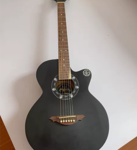 二手吉他 买了没怎么用 很新 弦有点松了不...