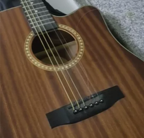 手感不错的一把吉他，适合初学者，弦距特别低...
