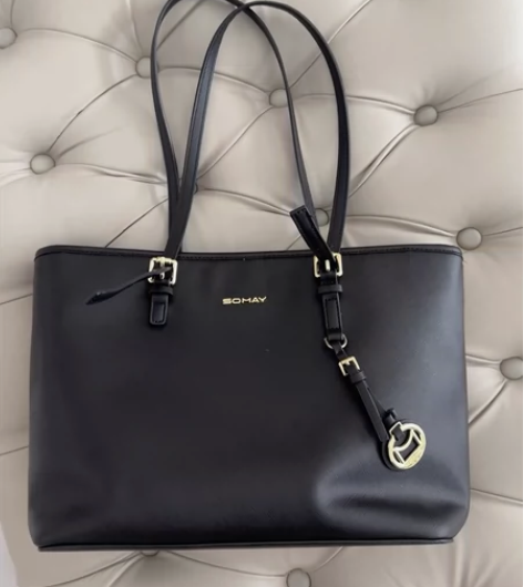 黑色托特包，八九成新，适合日常出差等。内里...