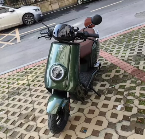 工作调动原因带不走  绿色新国标小牛电动车...