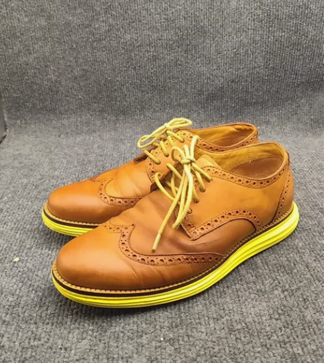 Cole Haan 可汗雕花布洛克休闲皮鞋...