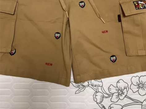 全新,刺绣醒狮短裤,无吊牌包装袋,专柜购买...