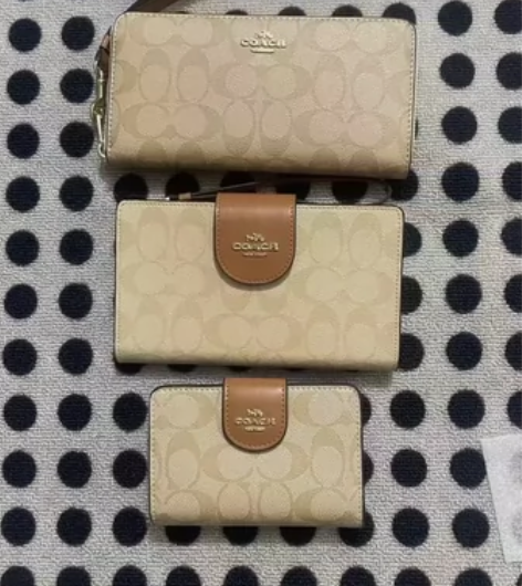 100包邮！蔻驰钱包，女士钱包 感兴趣的话...