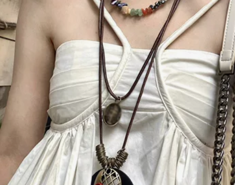 茶歇法式吊带连衣裙女2023夏季新款小众设...