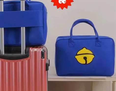 【处理9.9包邮】大容量卡通旅行包毛毡行李...