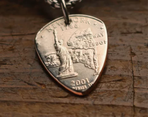 #diy手工坊 国外25美分硬币改制吉他拨...