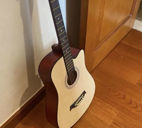 出闲置全新原价1200多的几乎全新吉他便宜...