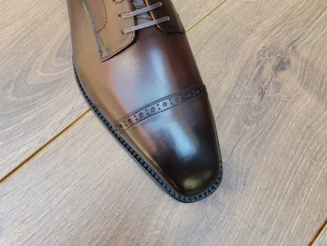 棕色阿德莱德半布洛克雕花琴底鞋 意大利进口...