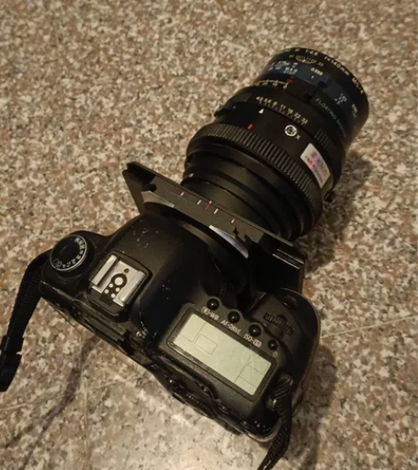 数码相机宽幅接片器。用佳能数码相机身，通过这个宽幅接片器连接...