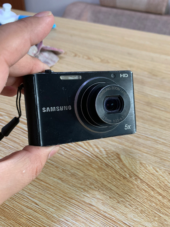 三星st77问题相机，如图，能开机，能照相...