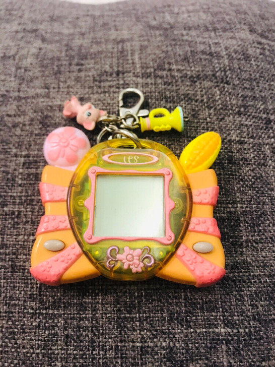 孩之宝至Q宠物游戏机 电子宠物屋 就是一个...