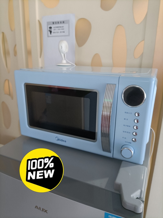 美的微波炉，放着没用过！