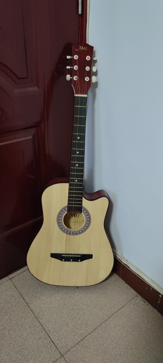 38寸新手吉他，适合新手练手用，买了之后玩...