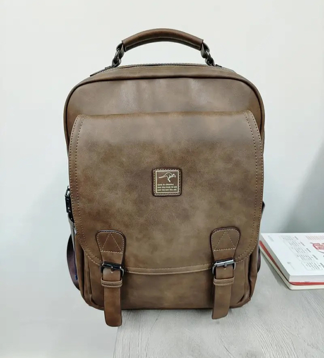 【厂家促销】木格袋鼠双肩包男韩版休闲青年学...