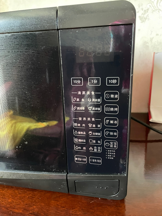 海尔微波炉,九成新,家里不怎么用微波炉,转...