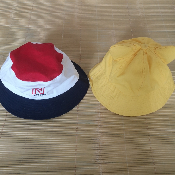 全新的，两个遮阳帽。白色的80购入，黄色的...