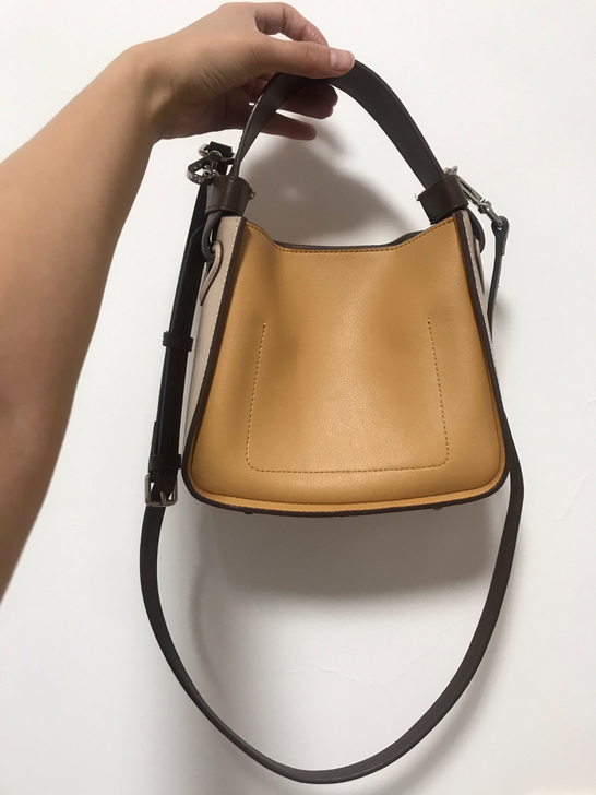 棕土黄牛皮水桶单肩包手拎包,吸铁磁扣,内搭...