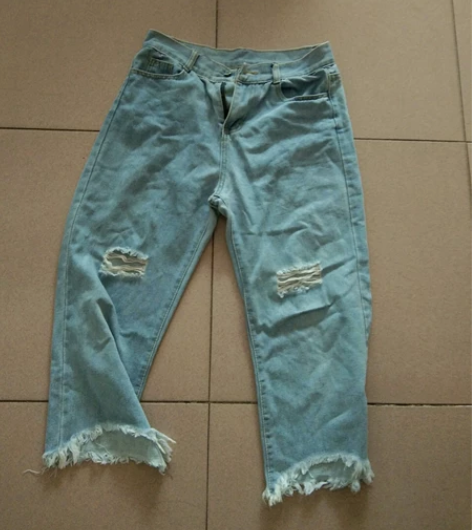 破洞浅蓝色牛仔裤l码 感兴趣的话点“我想要...