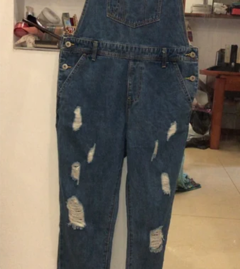 9成新，腰围84，腰部有扣子可解开，破洞背...