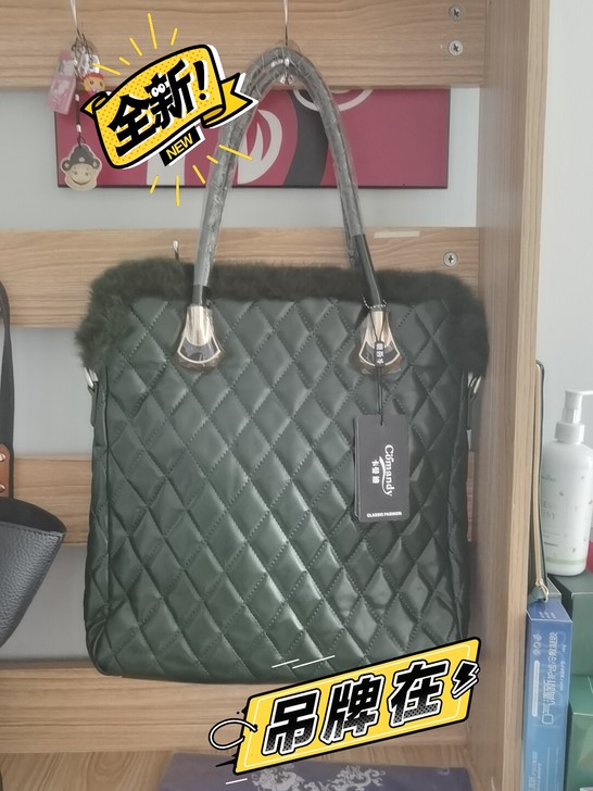 全新真皮大包，绿色很正很漂亮，包上面一圈是...
