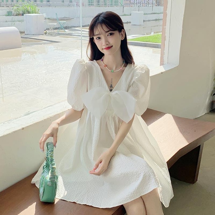 白色初恋蝴蝶结泡泡袖连衣裙女夏季2021新...