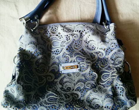 全新 单肩包镂空 内有亮片 秘密花园图案包...