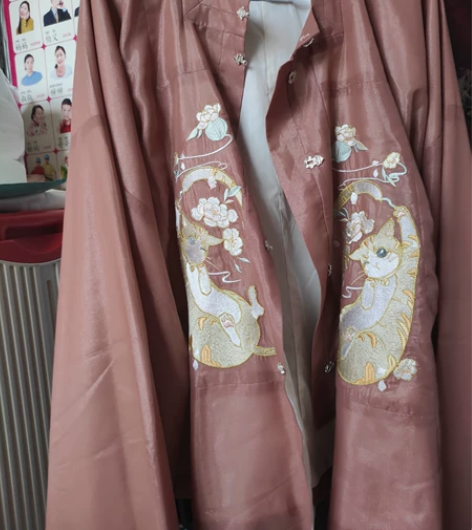 可换 她说家大橘为重上袄l码驼色 实物是脏...