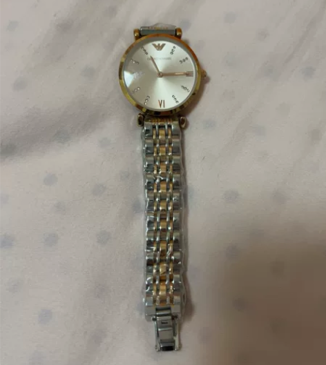 出一块刚买的阿玛尼女士手表，97新，时间走...