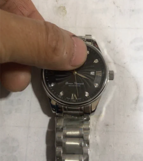 全自动机械表走时正常功能完好.能上链调时....