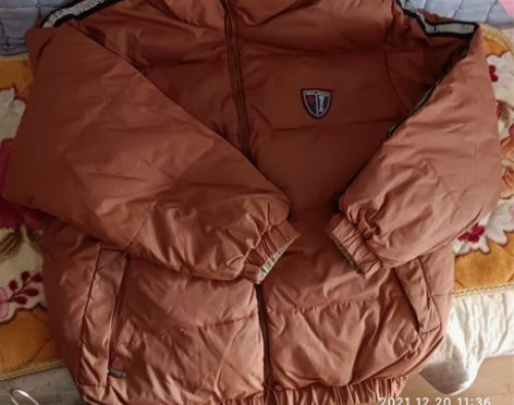 羽绒面包服一件男士的！很暖和的九成新的！1...