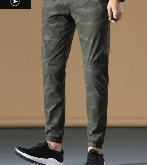 全新男士休闲裤，绿色/黑色两个色号，M至5...