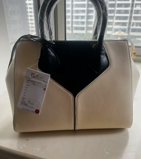 全新女士黑白拼色手拿包 ，有长肩带，配色好...