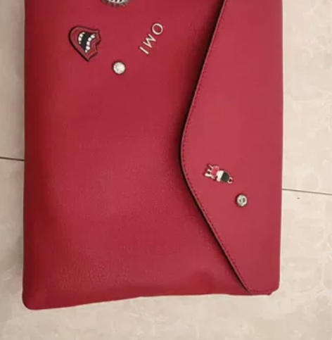 OMI手拿包女夏简约时尚气质真皮信封包软皮...