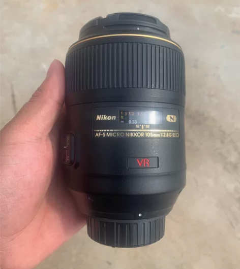 尼康105VR微距成色新，镜头上面有一点点...