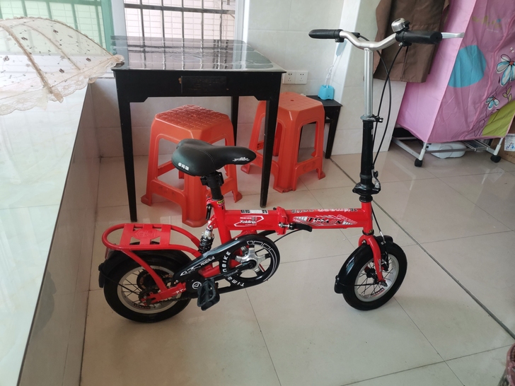 出售自用自行车  小学父亲买的骑了一个月没...