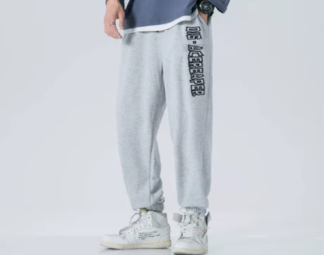 秋季潮流字母印花个性休闲卫裤男束脚裤宽松百...
