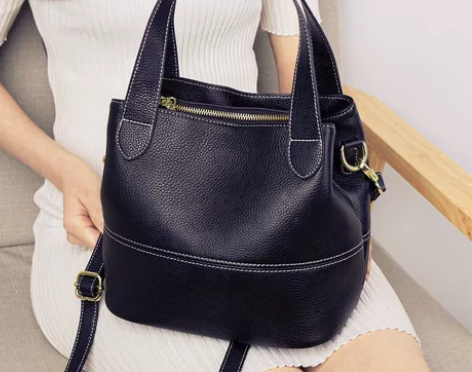 真皮水桶包女2022新款潮时尚韩版撞色手提...
