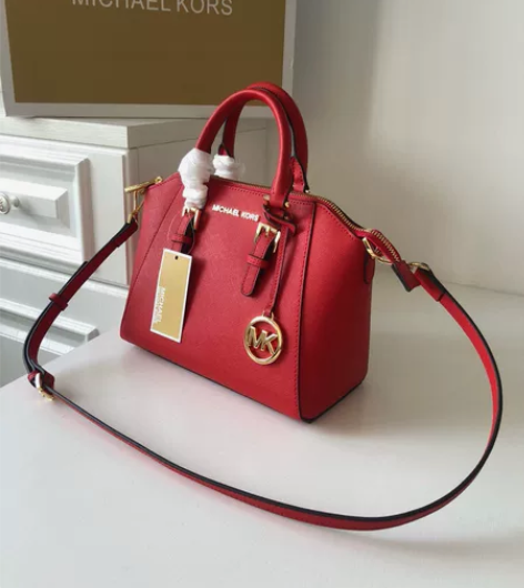 全新全皮mk新款女士十字纹牛皮饺子包，手提...