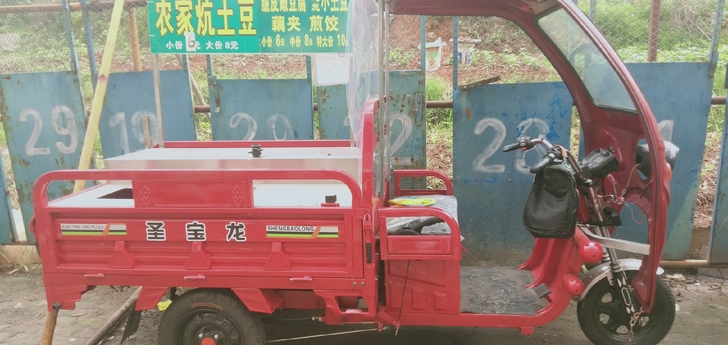 新车买来半个多月，做了雨棚，又做了架子，用...